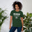 Woman wearing Reagan High School Rattlers Forest Green Premium Unisex T-shirt 003