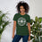 Woman wearing Reagan High School Rattlers Forest Green Premium Unisex T-shirt 203