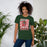Woman wearing The Woodlands High School Highlanders Forest Green Premium Unisex T-shirt 226
