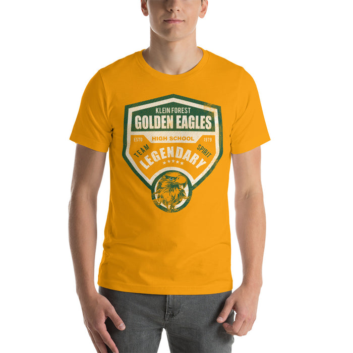 Man wearing a Klein Forest High School Premium Gold Unisex T-shirt 14