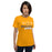 Woman wearing a Klein High School Bearkats Premium Gold Unisex T-shirt 96