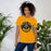 Woman wearing a Klein Oak High School Panthers Premium Gold Unisex T-shirt 207