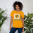 Woman wearing Klein Forest High School Golden Eagles Premium Gold Unisex T-shirt 235