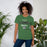 Woman wearing Spring High School Lions Heather Green Premium Unisex T-shirt 034