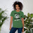 Woman wearing Spring High School Lions Heather Green Premium Unisex T-shirt 205