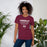 Woman wearing Lewisville High School Farmers Maroon Premium Unisex T-shirt 003