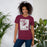 Woman wearing Round Rock High School Dragons Maroon Premium Unisex T-shirt 226