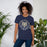 Woman wearing a Klein Collins High School Tigers Premium Navy T-shirt 19