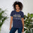 Woman wearing a Klein Collins High School Tigers Premium Navy T-shirt 24