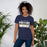 Woman wearing a Klein Collins High School Tigers Premium Navy T-shirt 31