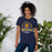 Woman wearing Nimitz High School Cougars Navy Blue Premium Unisex T-shirt 206