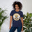 Woman wearing Nimitz High School Cougars Navy Blue Premium Unisex T-shirt 215