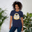 Woman wearing Nimitz High School Cougars Navy Blue Premium Unisex T-shirt 219