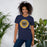 Woman wearing Nimitz High School Cougars Navy Blue Premium Unisex T-shirt 224