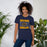 Woman wearing Nimitz High School Cougars Navy Blue Premium Unisex T-shirt 233