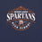 A navy blue graphic print featuring the text 'SEVEN LAKES SPARTANS HIGH SCHOOL' in white and orange, with a Spartan helmet logo in the center and decorative flourishes above. Seven Lakes High School Spartans Navy Blue Premium Unisex T-shirt 211