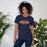 Woman wearing Seven Lakes High School Spartans Navy Blue Premium Unisex T-shirt 002