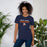 Woman wearing Seven Lakes High School Spartans Navy Blue Premium Unisex T-shirt 017
