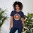 Woman wearing Seven Lakes High School Spartans Navy Blue Premium Unisex T-shirt 220