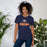 Woman wearing Seven Lakes High School Spartans Navy Blue Premium Unisex T-shirt 222