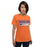 Woman wearing a Grand Oaks High School Grizzlies Premium Orange Unisex T-shirt 31