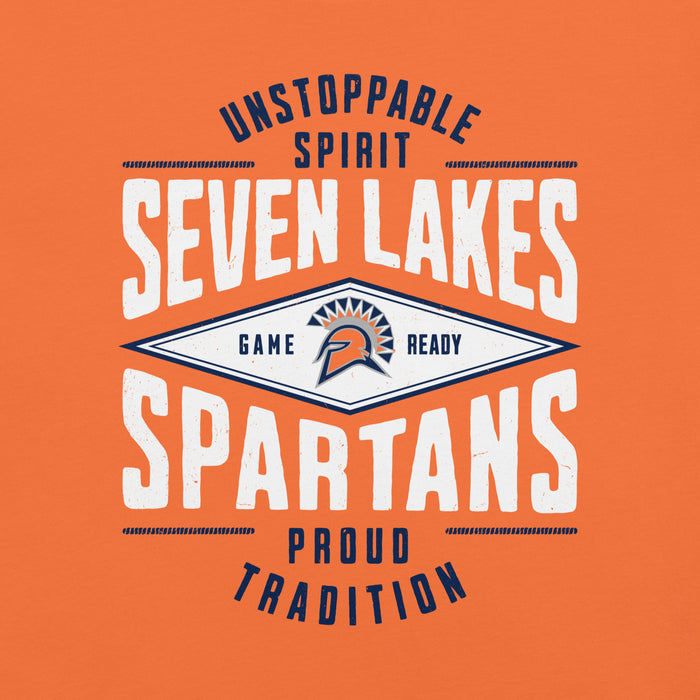 A graphic print on an orange fabric background featuring the text 'SEVEN LAKES SPARTANS' in large white letters, with 'UNSTOPPABLE SPIRIT' above and 'PROUD TRADITION' below. A central diamond logo contains a Spartan helmet and the words 'GAME READY'. Seven Lakes High School Spartans Orange Premium Unisex T-shirt 210