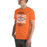 Man wearing Seven Lakes High School Spartans Orange Premium Unisex T-shirt 210