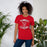 Woman wearing Tomball High School Cougars Red Premium Unisex T-shirt 228