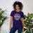 Woman wearing Morton Ranch High School Mavericks Premium Purple Unisex T-shirt 254