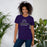 Woman wearing Morton Ranch High School Mavericks Premium Purple Unisex T-shirt 222