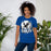 Woman wearing New Caney High School Eagles Royal Blue Premium Unisex T-shirt 202