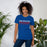 Woman wearing Sam Houston High School Texans Royal Blue Premium Unisex T-shirt 024