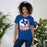 Woman wearing Sam Houston High School Texans Royal Blue Premium Unisex T-shirt 202