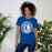 Woman wearing St. Frederick High School Warriors Royal Blue Premium Unisex T-shirt 220