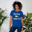 Woman wearing New Caney High School Eagles Royal Blue Premium Unisex T-shirt 233