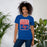 Woman wearing Sam Houston High School Texans Royal Blue Premium Unisex T-shirt 001