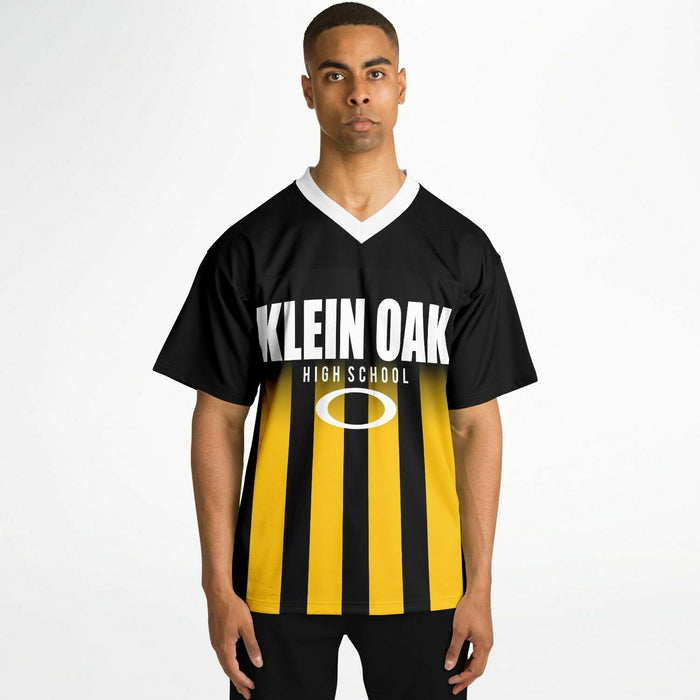 Black man wearing Klein Oak Panthers football Jersey