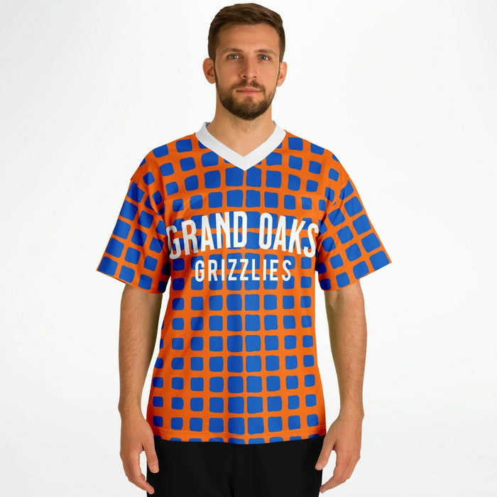 Man wearing Grand Oaks Grizzlies football jersey