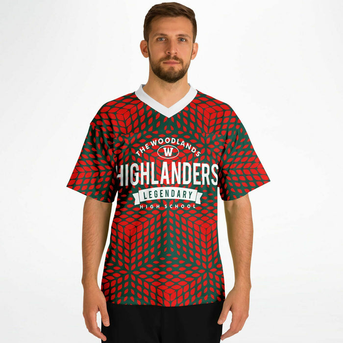 Man wearing The Woodlands Highlanders High School football jersey