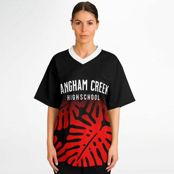 Women wearing Langham Creek Lobos football jersey