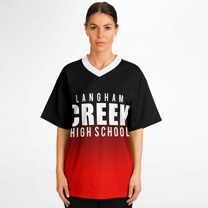 Women wearing Langham Creek Lobos football jersey