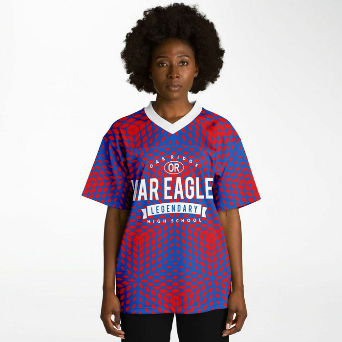 Black woman wearing Oak Ridge War Eagles High School football Jersey