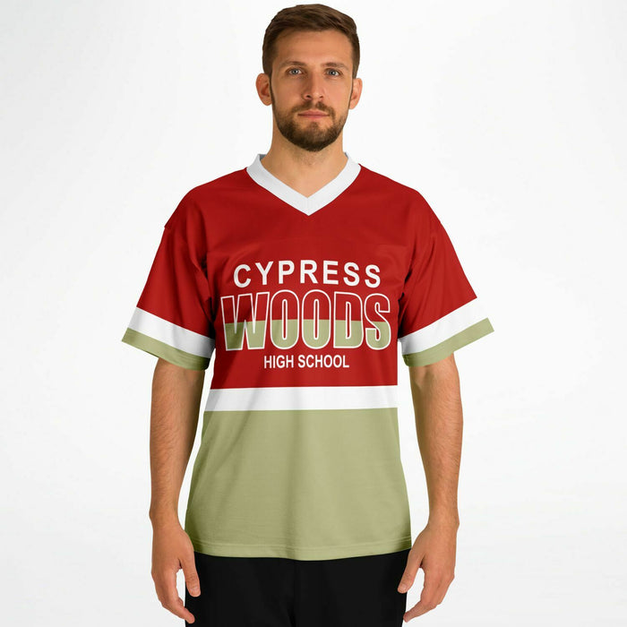 Man wearing Cypress Woods Wildcats football jersey 10