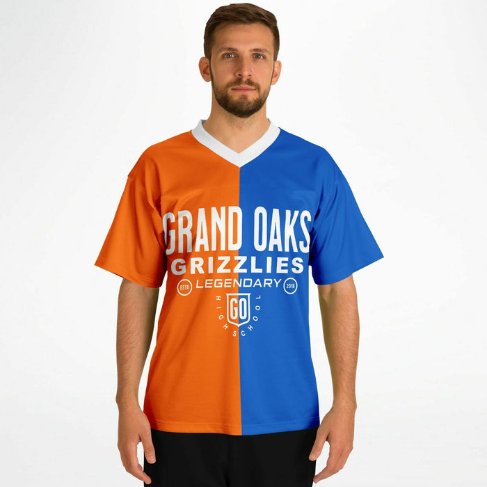 Man wearing Grand Oaks Grizzlies football jersey
