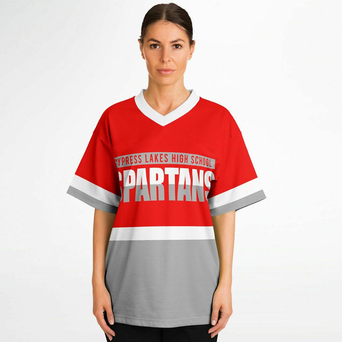 Women wearing Cypress Lakes Spartans football jersey