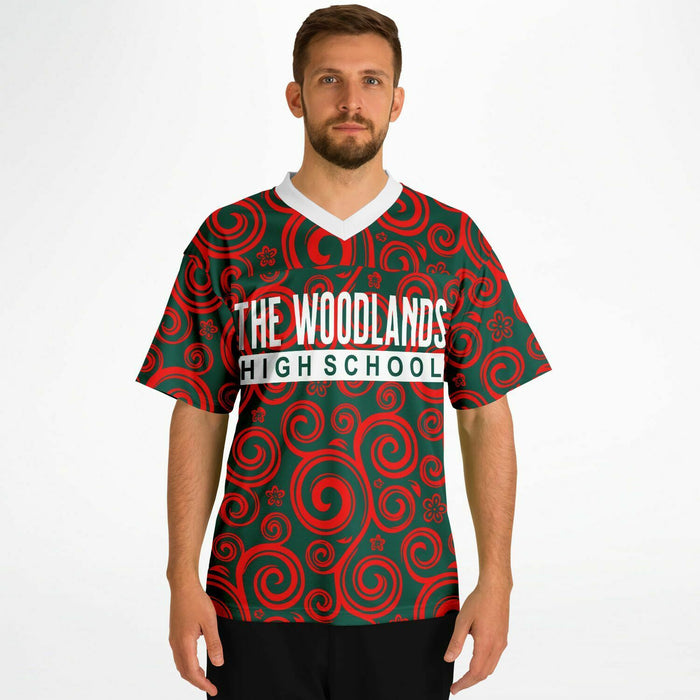 Man wearing The Woodlands Highlanders High School football jersey