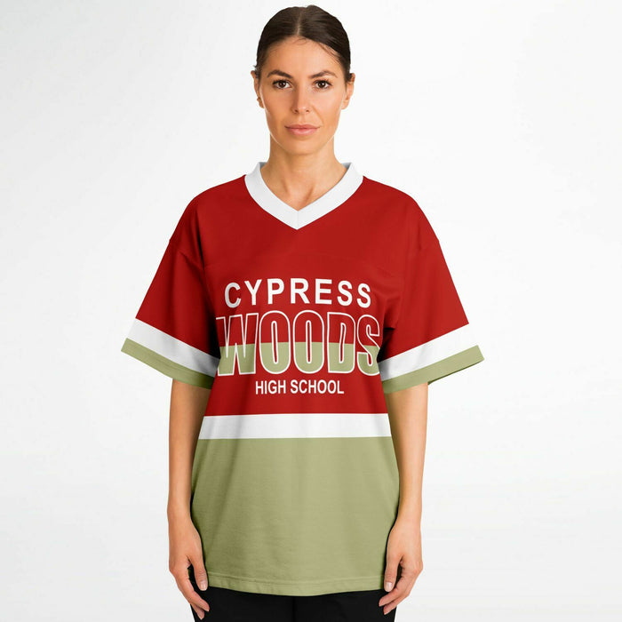 Women wearing Cypress Woods Wildcats football jersey 10