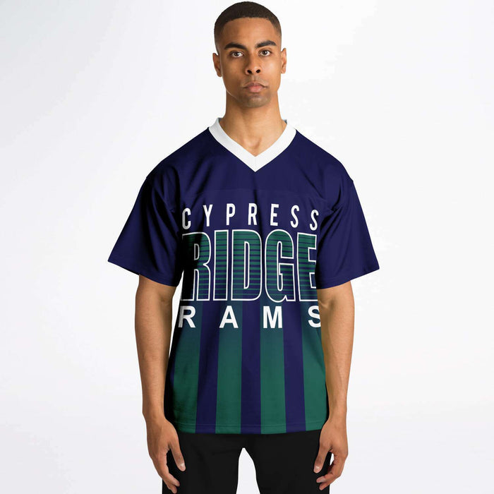 Black man wearing Cypress Ridge Rams football Jersey