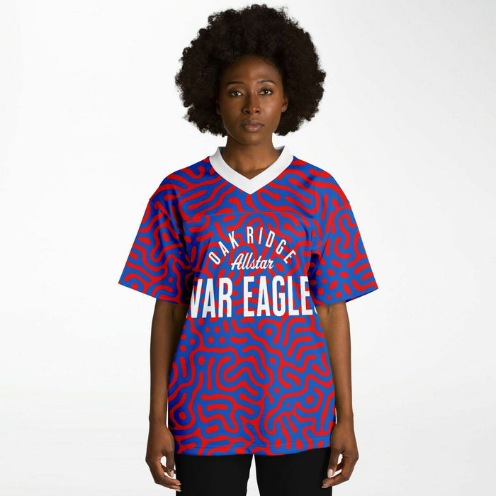 Black woman wearing Oak Ridge War Eagles High School football Jersey