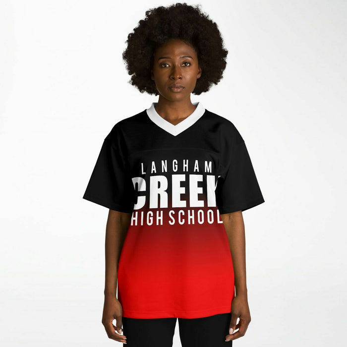 Black woman wearing Langham Creek Lobos football Jersey